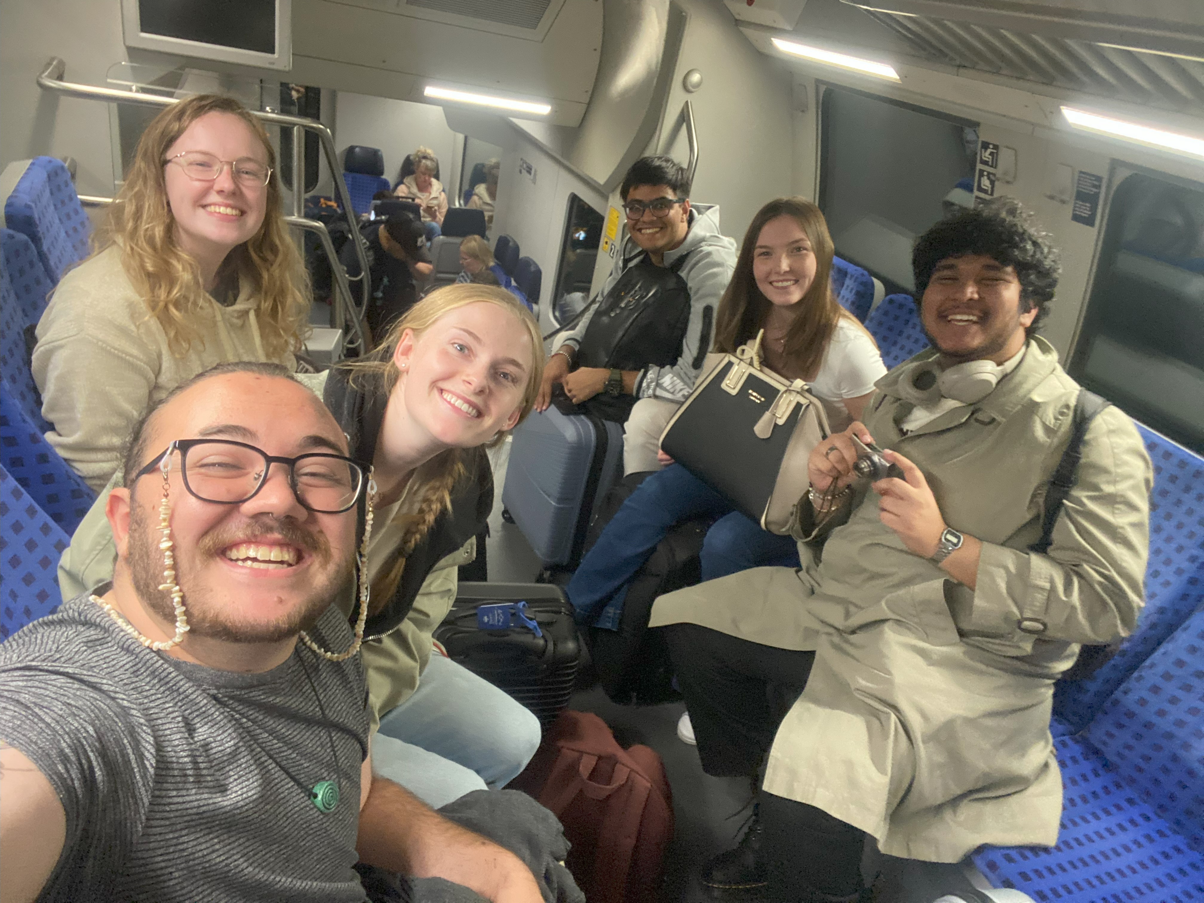 A group of students on a train.